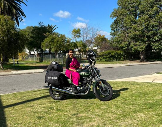 FIRST INDIAN WOMAN’S JOURNEY ACROSS THREE CONTINENTS ON BIKE IN A TRADITIONAL NAUVARI SAREE