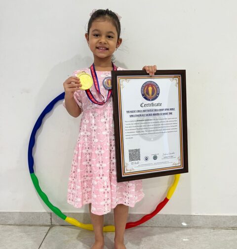 Youngest Child and Fastest Hula Hoop Spins While Simultaneously Sacred Mantra In Short Time World Record