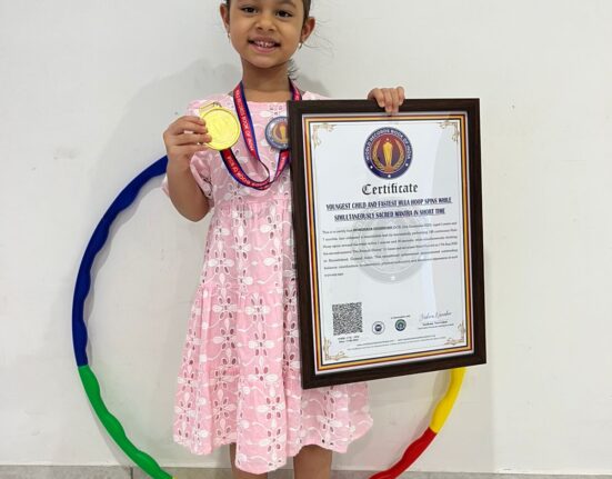 Youngest Child and Fastest Hula Hoop Spins While Simultaneously Sacred Mantra In Short Time World Record