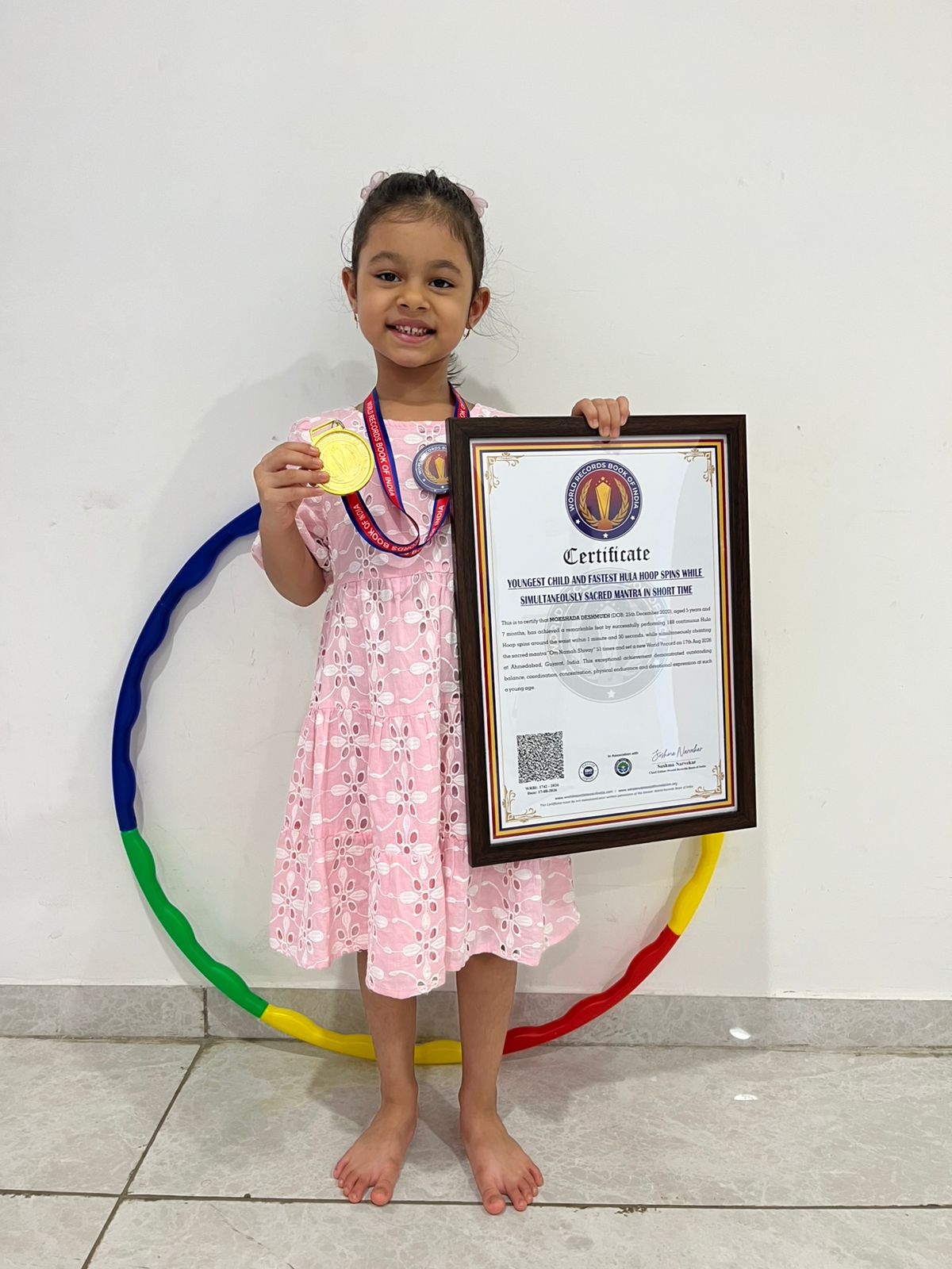 Youngest Child and Fastest Hula Hoop Spins While Simultaneously Sacred Mantra In Short Time World Record